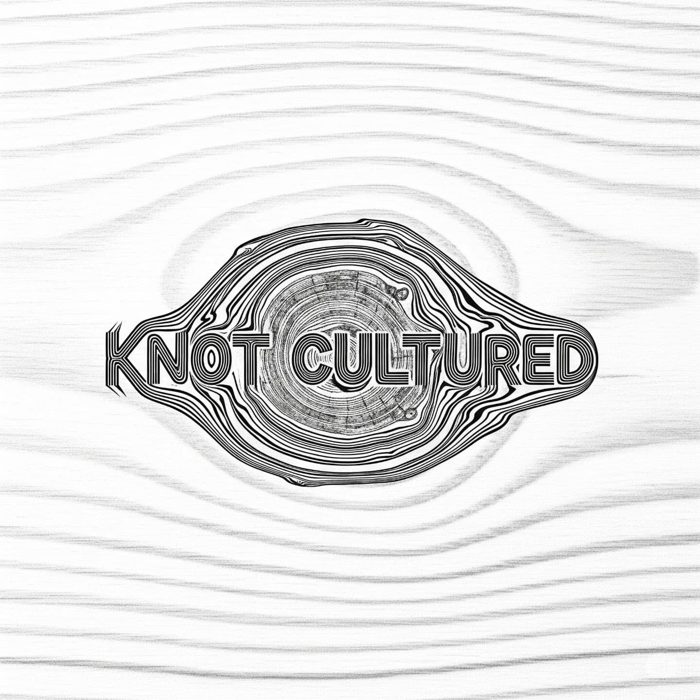 Knot Cultured wordmark set in the rings of a wood knot on pale wood grain